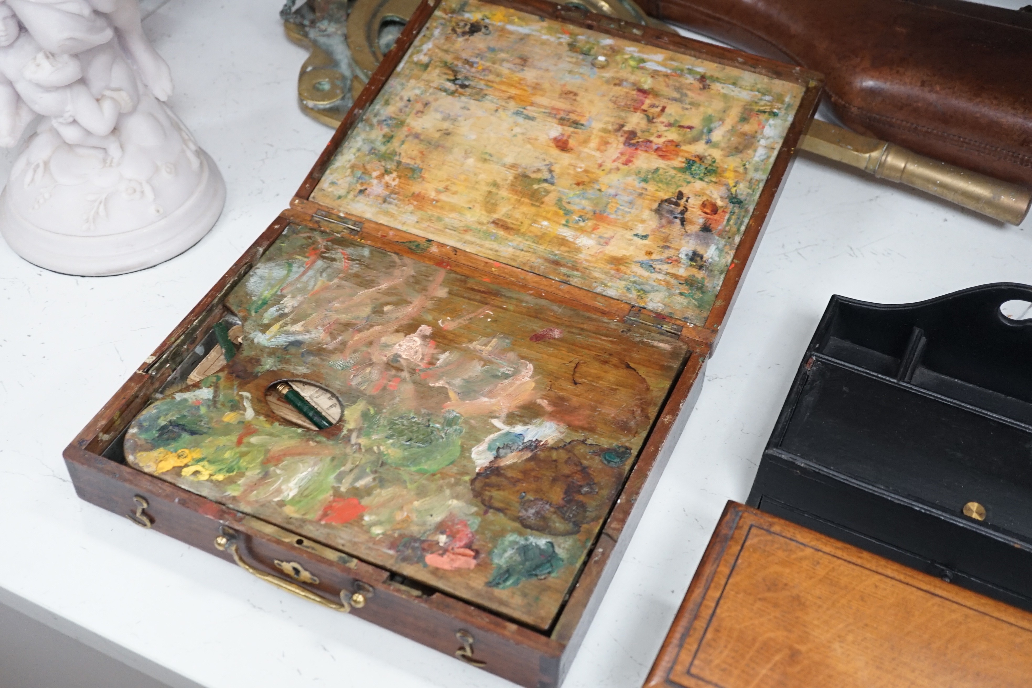 An artist’s paint box with original palette, Windsor and Newton paints, Faber pencils, etc., together with a stationary/pen box and a smokers box, widest 31cm (3)